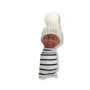 Micro Mini Swaddled Resin Mixed Race Reborn Doll with hat.